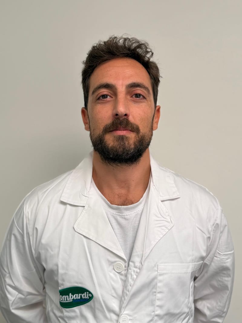 Dr Carlo Canonico, Technical Director of Lodifa, wearing a lab coat